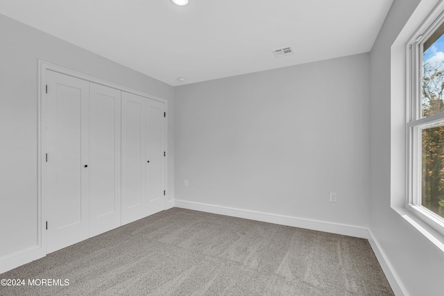 169 Grand Central Pkwy, Bayville, NJ 08721 - unfurnished bedroom with carpet, baseboards, and a closet