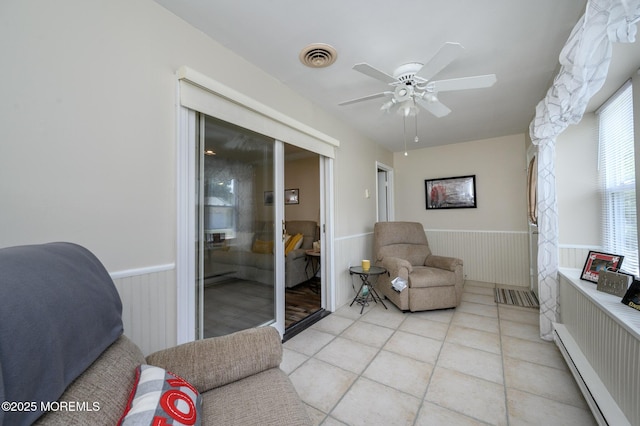 1A Winthrop Pl Unit 55, Whiting, NJ 08759 - sunroom featuring a ceiling fan and a baseboard radiator