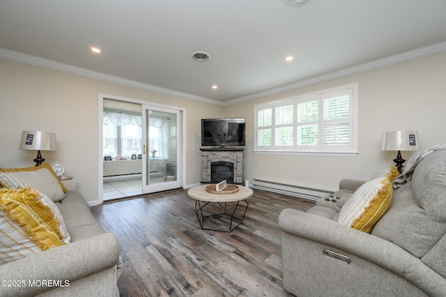 1A Winthrop Pl Unit 55, Whiting, NJ 08759 - living room featuring baseboard heating, healthy amount of natural light, ornamental molding, wood finished floors, and recessed lighting