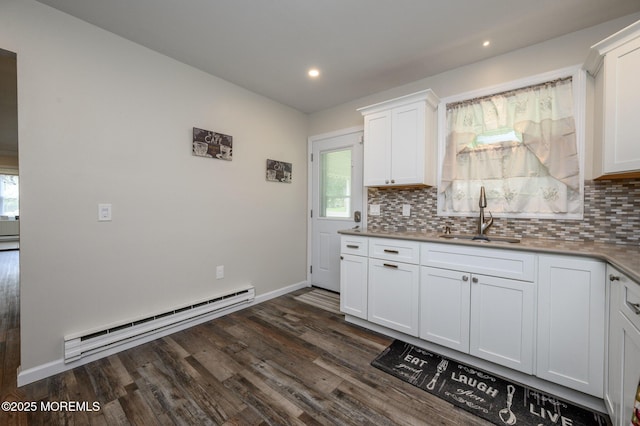 1A Winthrop Pl Unit 55, Whiting, NJ 08759 - kitchen featuring a sink, a baseboard radiator, dark wood-style flooring, tasteful backsplash, and recessed lighting