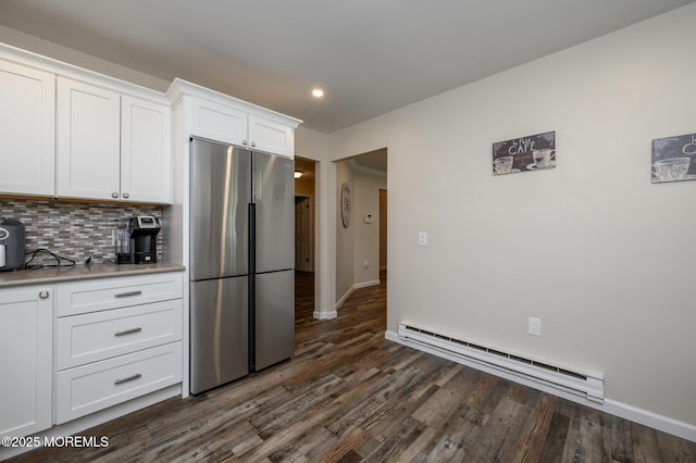 1A Winthrop Pl Unit 55, Whiting, NJ 08759 - kitchen featuring stainless steel fridge, baseboard heating, dark wood finished floors, backsplash, and recessed lighting