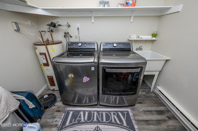 1A Winthrop Pl Unit 55, Whiting, NJ 08759 - laundry room with electric water heater, baseboard heating, wood finished floors, washing machine and clothes dryer, and baseboards