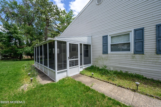 1A Winthrop Pl Unit 55, Whiting, NJ 08759 - view of side of home featuring a sunroom and a yard