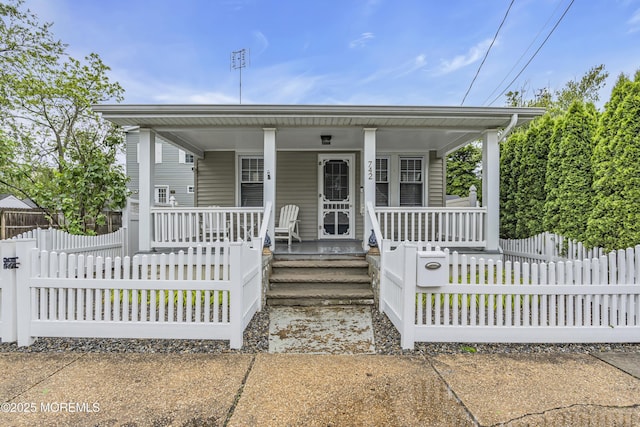 742 Leroy Pl, Lake Como, NJ 07719 - bungalow-style home with a porch and a fenced front yard