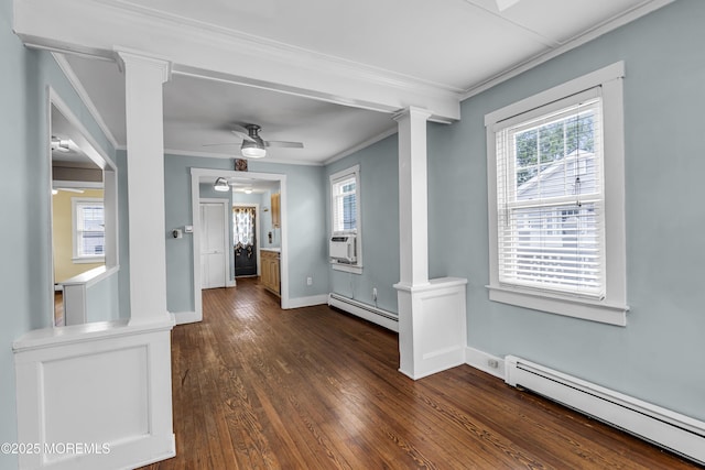 742 Leroy Pl, Lake Como, NJ 07719 - empty room featuring a baseboard radiator, decorative columns, crown molding, dark wood finished floors, and baseboards