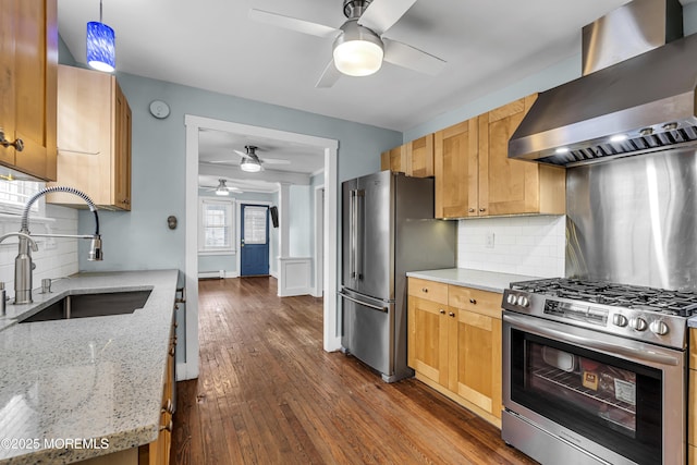 742 Leroy Pl, Lake Como, NJ 07719 - kitchen featuring wall chimney exhaust hood, stainless steel appliances, a sink, a ceiling fan, and dark wood-style floors