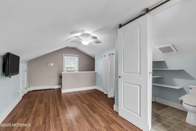 742 Leroy Pl, Lake Como, NJ 07719 - additional living space featuring a baseboard heating unit, ceiling fan, vaulted ceiling, a barn door, and wood finished floors