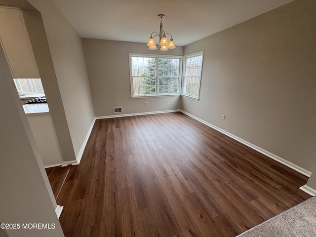 35 Deer Dr S, Barnegat, NJ 08005 - unfurnished dining area featuring a chandelier, dark wood finished floors, and baseboards