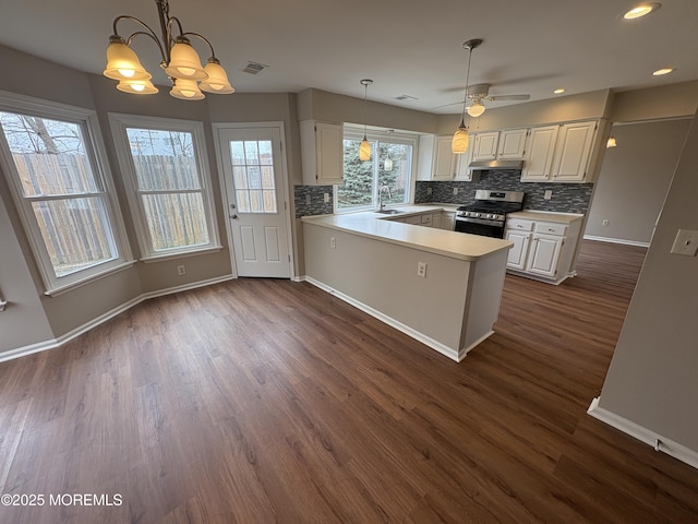 35 Deer Dr S, Barnegat, NJ 08005 - kitchen featuring gas range, a sink, a peninsula, tasteful backsplash, and recessed lighting