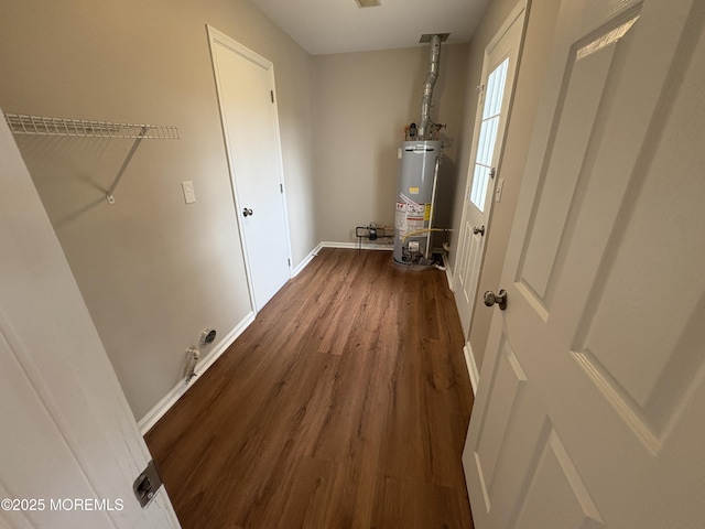 35 Deer Dr S, Barnegat, NJ 08005 - laundry area with gas water heater, dark wood-style floors, and baseboards