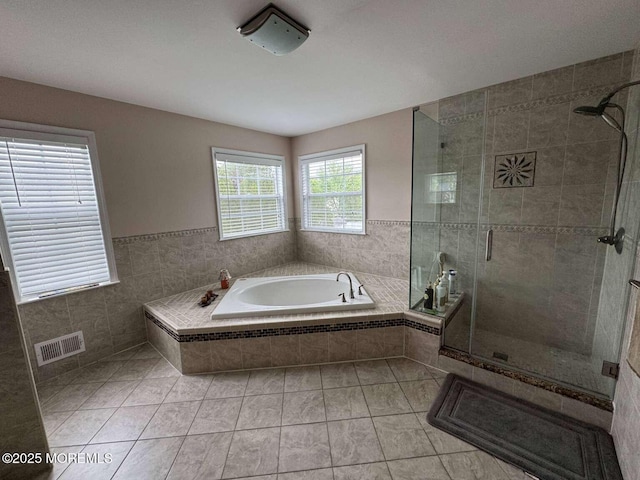 36 Graversham Dr, Marlboro, NJ 07746 - bathroom with a bath, tile patterned flooring, and a stall shower