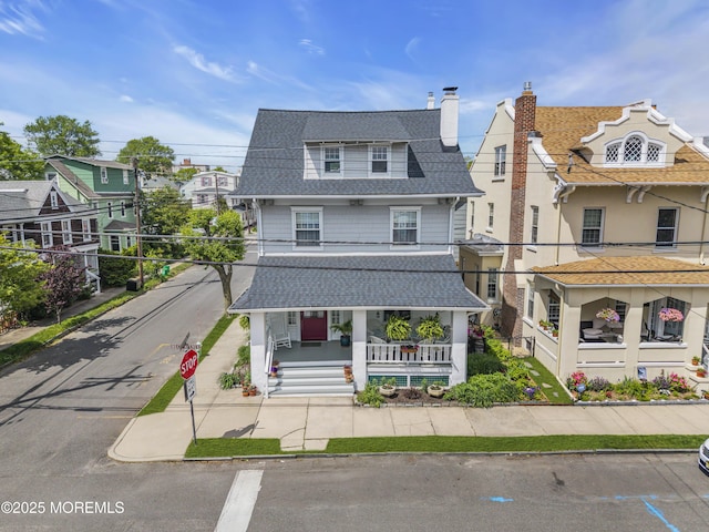 89 Heck Ave, Ocean Grove, NJ 07756 - view of front facade with covered porch and roof with shingles