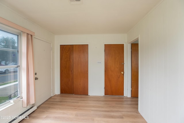 343 Barbados Dr N, Toms River, NJ 08757 - unfurnished room featuring light wood-style flooring and a baseboard heating unit