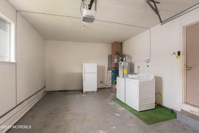 343 Barbados Dr N, Toms River, NJ 08757 - garage with freestanding refrigerator, washing machine and clothes dryer, a garage door opener, and water heater