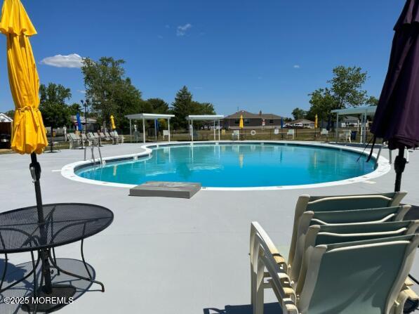 343 Barbados Dr N, Toms River, NJ 08757 - community pool with a patio area