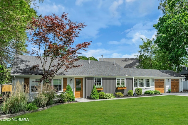 2574 Algonkin Trl, Manasquan, NJ 08736 - view of front of house with a garage, a front lawn, board and batten siding, and a shingled roof