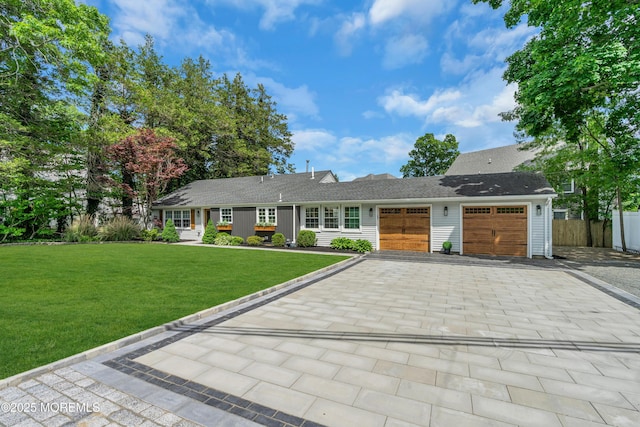 2574 Algonkin Trl, Manasquan, NJ 08736 - view of front of home featuring an attached garage and driveway