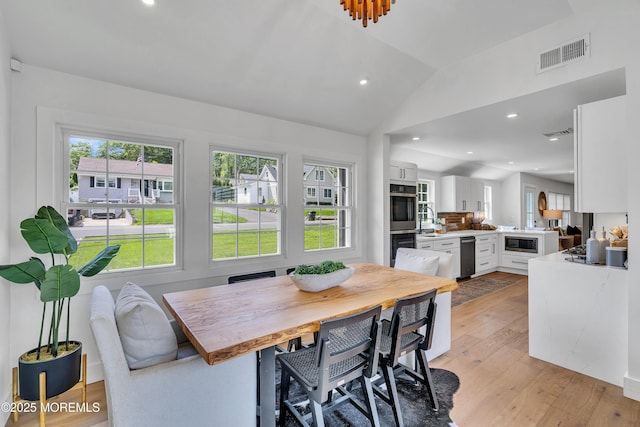 2574 Algonkin Trl, Manasquan, NJ 08736 - dining space featuring vaulted ceiling, light wood-style flooring, and recessed lighting