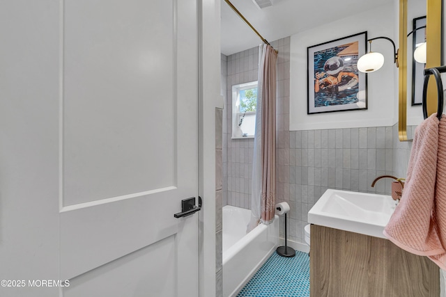 2574 Algonkin Trl, Manasquan, NJ 08736 - full bath featuring tile walls, shower / bathtub combination with curtain, vanity, and toilet