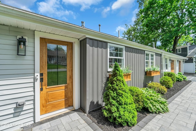 2574 Algonkin Trl, Manasquan, NJ 08736 - property entrance featuring board and batten siding