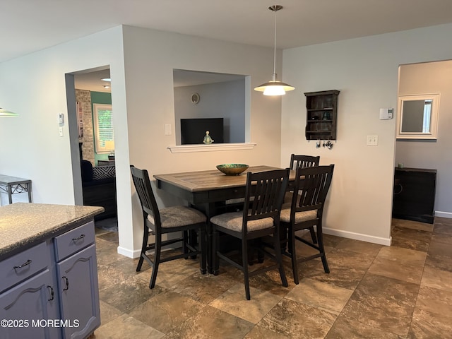 15 Tudor Ct, Brick, NJ 08723 - dining room featuring stone tile flooring and baseboards