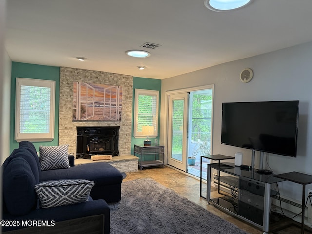 15 Tudor Ct, Brick, NJ 08723 - living room with a fireplace and a baseboard radiator