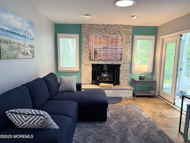 15 Tudor Ct, Brick, NJ 08723 - living area featuring healthy amount of natural light and stone finish flooring