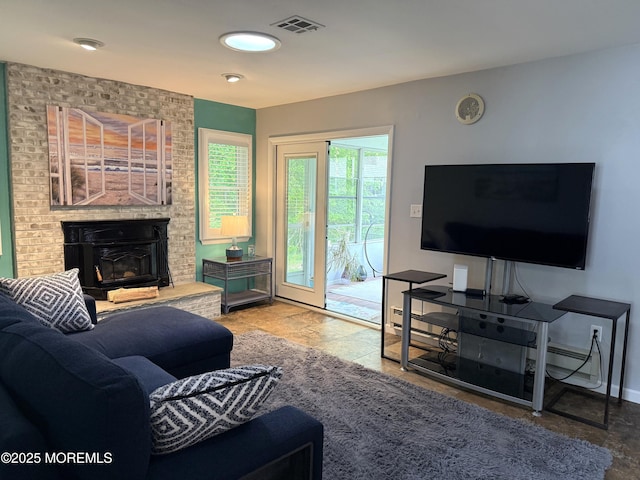 15 Tudor Ct, Brick, NJ 08723 - living area with a brick fireplace and baseboards