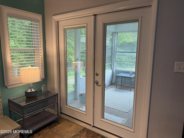 15 Tudor Ct, Brick, NJ 08723 - entryway with healthy amount of natural light, stone finish floors, and french doors