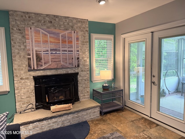 15 Tudor Ct, Brick, NJ 08723 - entryway with stone finish floors and a fireplace