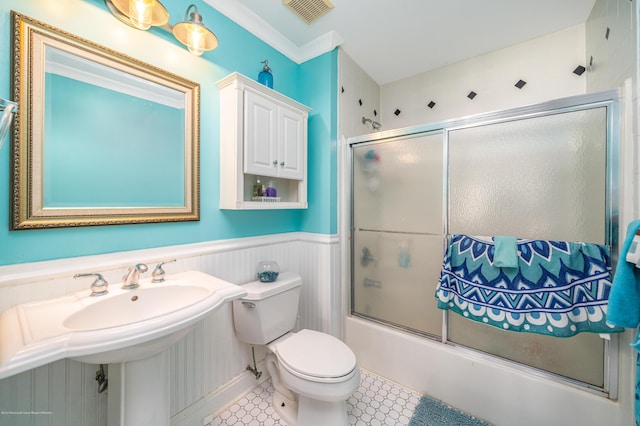 834 Leeward Dr, Forked River, NJ 08731 - full bathroom with toilet, shower / bath combination with glass door, and wainscoting