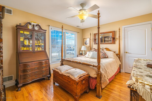 834 Leeward Dr, Forked River, NJ 08731 - bedroom with light wood finished floors and ceiling fan