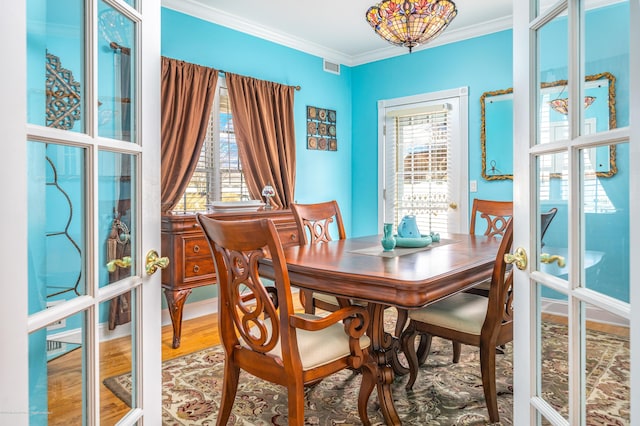 834 Leeward Dr, Forked River, NJ 08731 - dining space featuring ornamental molding and wood finished floors