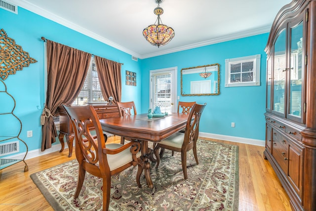 834 Leeward Dr, Forked River, NJ 08731 - dining space featuring crown molding, baseboards, and light wood finished floors