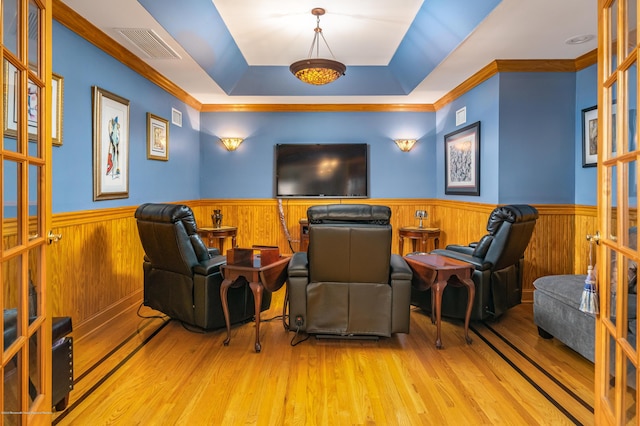 834 Leeward Dr, Forked River, NJ 08731 - home theater room featuring a wainscoted wall, wood finished floors, and crown molding