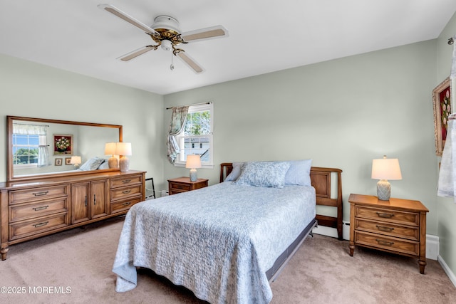 604 N Blvd, Lake Como, NJ 07719 - bedroom with light colored carpet, ceiling fan, and a baseboard heating unit