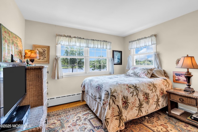 604 N Blvd, Lake Como, NJ 07719 - bedroom with a baseboard radiator and wood finished floors