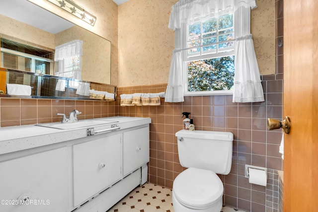 604 N Blvd, Lake Como, NJ 07719 - full bathroom with vanity, tile walls, wallpapered walls, a stall shower, and wainscoting