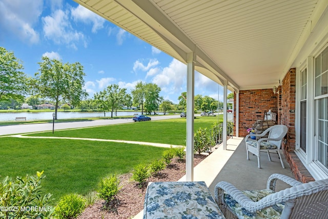 604 N Blvd, Lake Como, NJ 07719 - porch with a water view and a yard