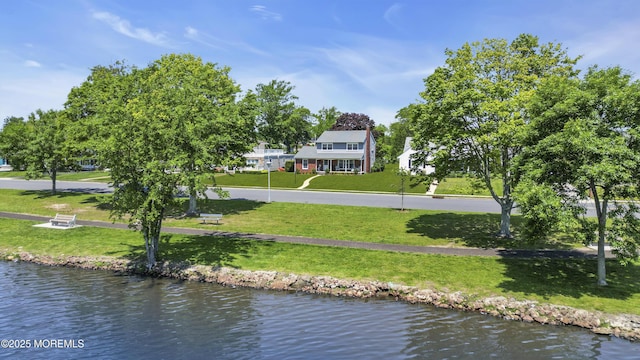 604 N Blvd, Lake Como, NJ 07719 - surrounding community featuring a lawn and a water view