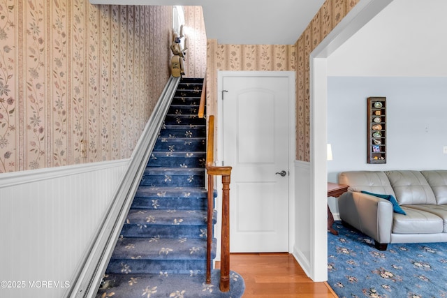 604 N Blvd, Lake Como, NJ 07719 - stairway with wallpapered walls, wainscoting, and wood finished floors