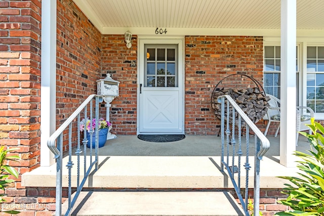 604 N Blvd, Lake Como, NJ 07719 - property entrance with covered porch and brick siding