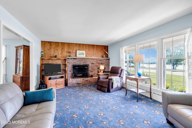 604 N Blvd, Lake Como, NJ 07719 - carpeted living room with wooden walls and a brick fireplace