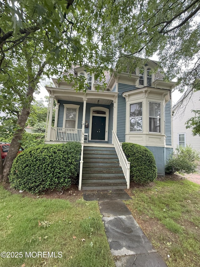 62 Washington St, Red Bank, NJ 07701 - view of front of house featuring a porch and stairway