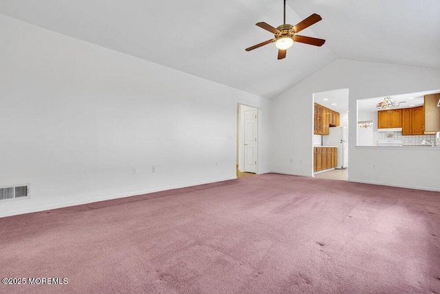 3167 Wood Spring Ln, Toms River, NJ 08755 - unfurnished living room with lofted ceiling, a ceiling fan, light carpet, and baseboards