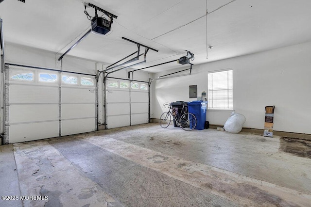 3167 Wood Spring Ln, Toms River, NJ 08755 - garage featuring a garage door opener and electric panel
