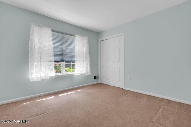 3167 Wood Spring Ln, Toms River, NJ 08755 - unfurnished bedroom featuring carpet floors, baseboards, and a closet
