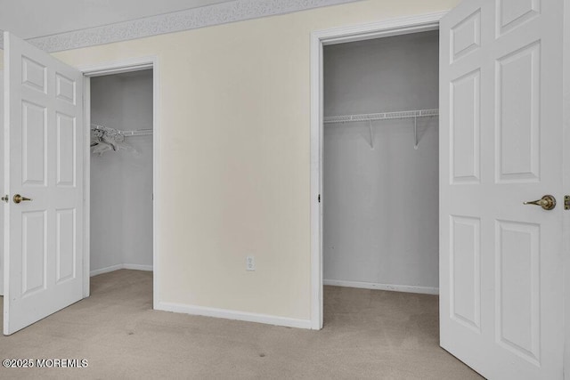 3167 Wood Spring Ln, Toms River, NJ 08755 - unfurnished bedroom with carpet, baseboards, a spacious closet, and a closet