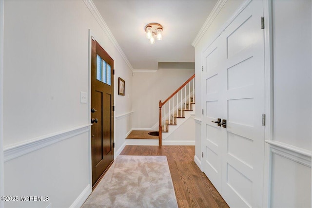 18 Vaughn Dr, Middletown, NJ 07748 - foyer entrance featuring stairs, dark wood finished floors, crown molding, and baseboards