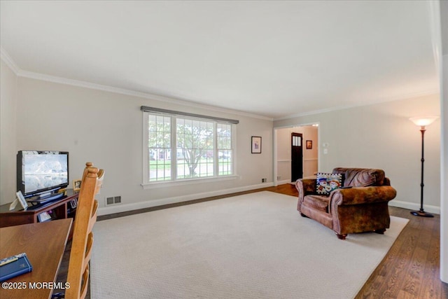 18 Vaughn Dr, Middletown, NJ 07748 - living area featuring wood finished floors, crown molding, and baseboards